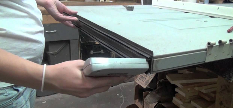 damaged steel door repair Dunedin